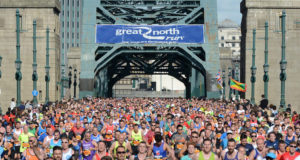 a photo of the Great North Run in action with thousands of runners