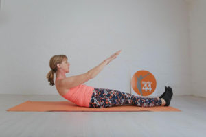 Roll Up being performed on a pilates mat