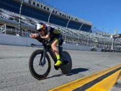 Man on a pedal bike on the Daytona track