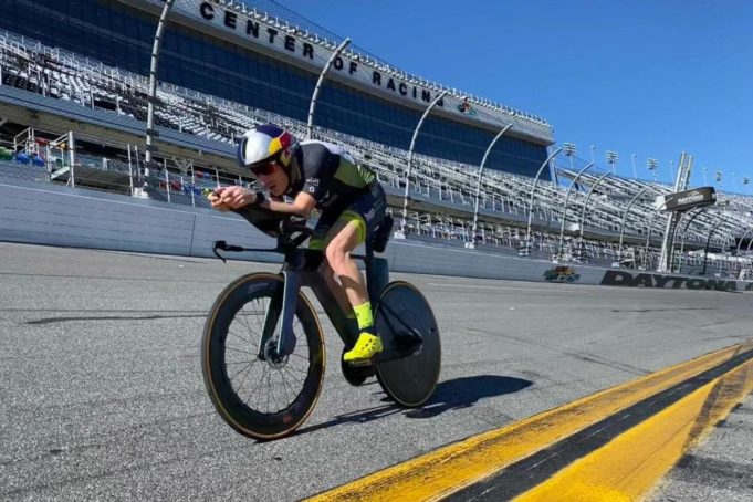 Man on a pedal bike on the Daytona track