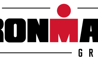 The IROMAN Group logo is all black text, apart from the M which is red, and has a dot over it to make it look like a person