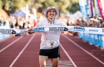 Tom Evans crosses the finish line of the Western States 100