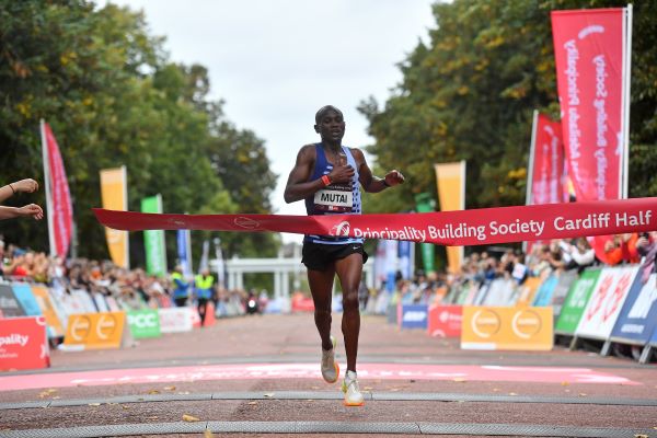 Vincent Mutai approaches the pink finishing tape at speed.