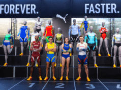 4 athletes stand amongst mannequins, all in different athletics kit