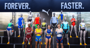 4 athletes stand amongst mannequins, all in different athletics kit