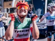 Female cyclist looks happy to have won