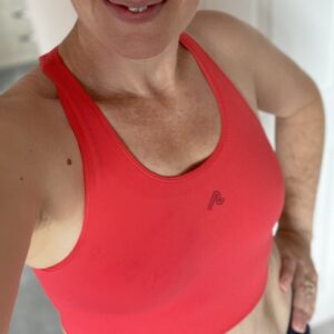 Woman wears red crop top