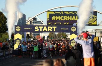 ESN to partner with Manchester Half Start gantry at MCR Half, runners get ready to start
