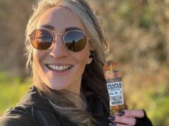 Young female runners holds maple coffee gel