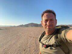 Man in desert takes a selfie