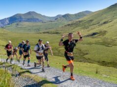 Happy runners on a trail race