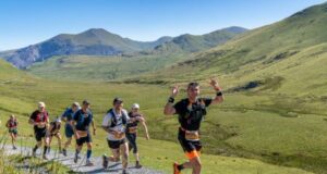 Happy runners on a trail race