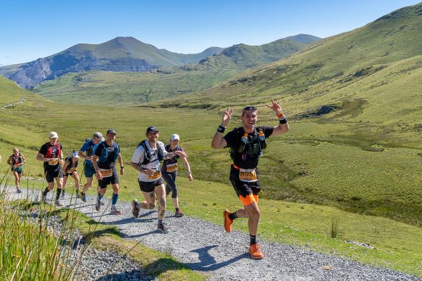 Happy runners on a trail race