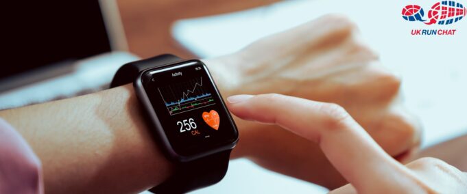 smartwatch on a persons wrist about to be pressed with a finger pointing at the screen