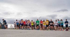 Runners line up on a start line