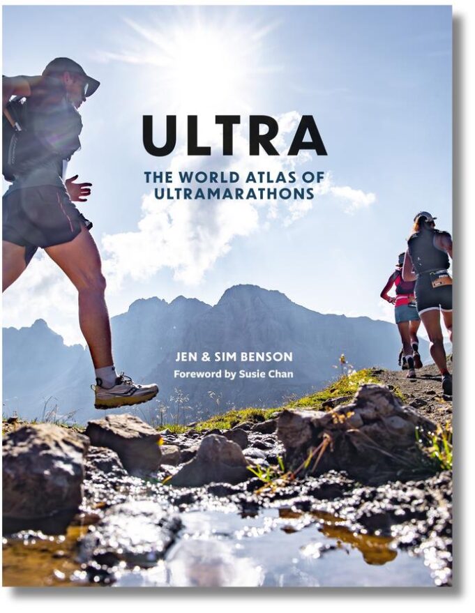 Cover of book Ultra: The World Atlas of Ultramarathons shows three runners in a remote landscape crossing a stream using large rocks