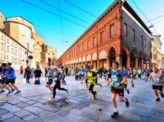 Runners run across an Italian square