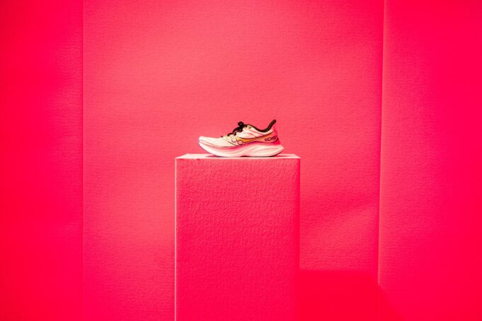 Shoe on a pink plinth in a pink room