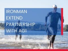 Image of triathletes running out of water. Words read: Ironman extend partnership with AG1