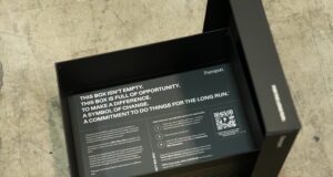 An empty black box with writing inside