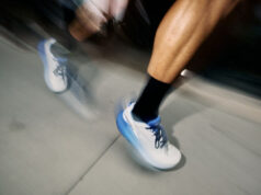 Altra launches WD VIA 2 Close up of blurred runners legs wearing white shoes with blue trim