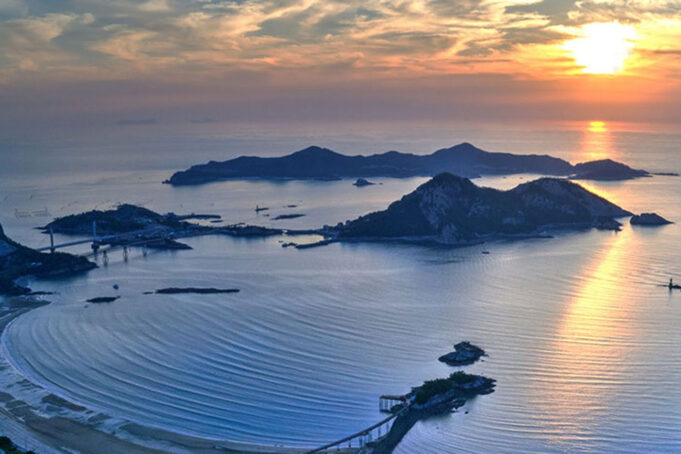 Gunsan Challenge Family A dreamy sunrise photo of islands in a blue sea