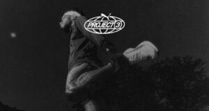 Black and white photo of a man running.