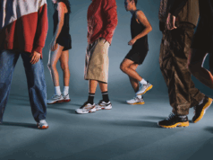 Lower bodies of people wearing different running shoes, some runners, some casually dressed