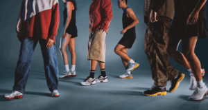 Lower bodies of people wearing different running shoes, some runners, some casually dressed