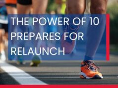 White text overlays an image of runners in a road race. The Power of 10 prepares for relaunch