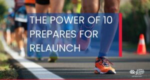 White text overlays an image of runners in a road race. The Power of 10 prepares for relaunch