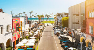 A low level LA street with the ocean in the ackground