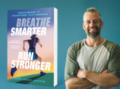 A man on the right of the picture smiles and looks at the camera, his arms folded. On the left is an image of the book Breathe Smarter, Run Stronger
