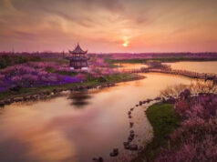 Challenge Family launches Challenge Shanghai An ethereal riverside landscape with a Chinese Temple