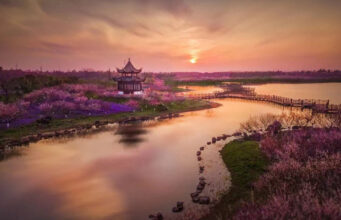 Challenge Family launches Challenge Shanghai An ethereal riverside landscape with a Chinese Temple