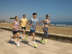 Joma adds colour to its R line Two men and two women n colourful kit run by the sea