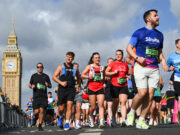 Jo Whiley, Alexandra Burke & Tyler West run London Landmarks Half Marathon Runners pass by the Elizabeth Tower/Big Ben