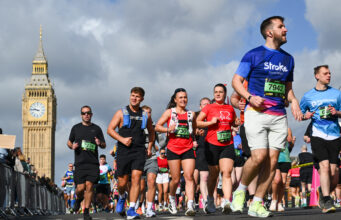Runners pass by the Elizabeth Tower/Big Ben