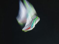 Arty shot of a white running shoe moving so fast it looks like it has Hermes wings