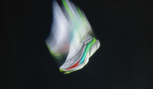 Saucony launches new Endorphin Elite 3 Arty shot of a white running shoe moving so fast it looks like it has Hermes wings