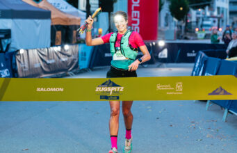 Salomon Zugspitz Ultratrail race recap Woman runs towards a finish line