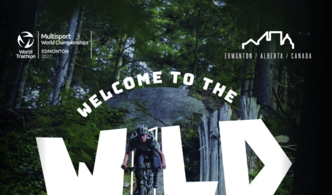 Person on bike in woods. Text over photo reads Welcome to the wild