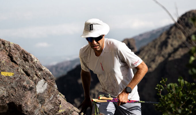 François D’Haene sets FKT on GR20 Man with poles passes through a high mountain gap
