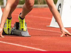 Hodgkinson and Kerr headline London Athletics Meet Close up of blonde woman in the starting blocks on a red track