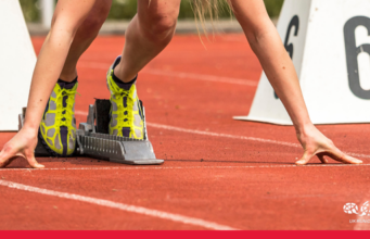 Hodgkinson and Kerr headline London Athletics Meet Close up of blonde woman in the starting blocks on a red track