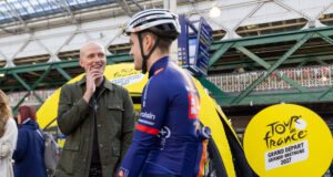 A man chats to a cyclist