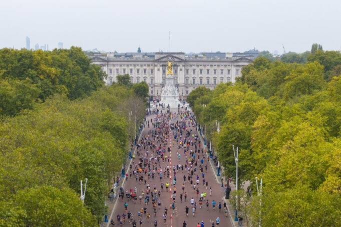 Aeriel view of a mass of runners along The Mall in front of Buckingham Palace