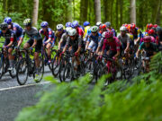 Stage routes for 2026 Lloyds Tour of Britain Women Peloton of female cyclists on a woodland road