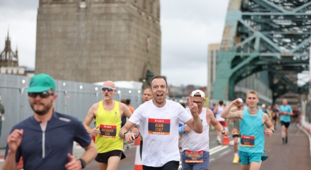13,000 runners at biggest ever Great North 10K Runners with the Tyne Bridge behind them
