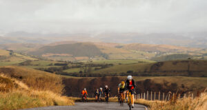 Cyclists on a winding mountain road